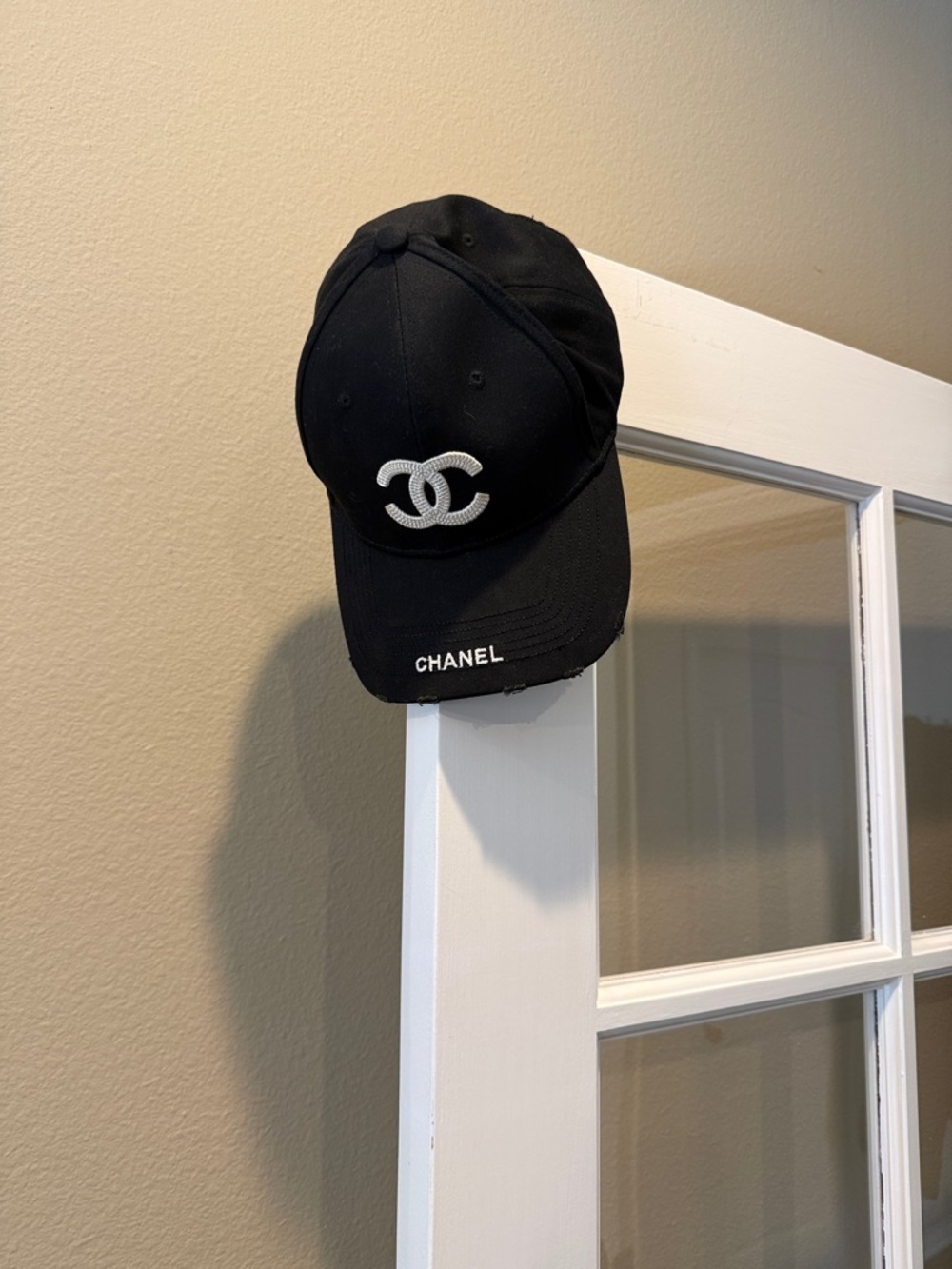 CHANEL Black Cap with White CC Logo